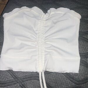 white crop top with tightened string